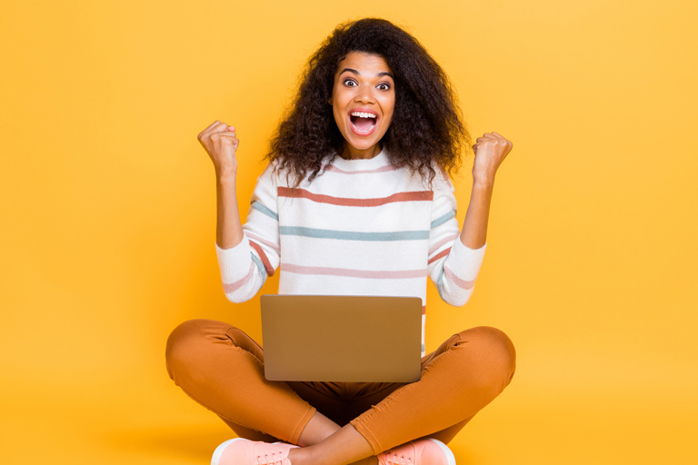 Woman looking at laptop