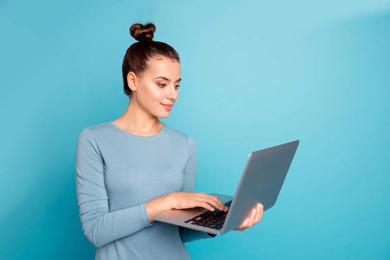 Woman looking at laptop