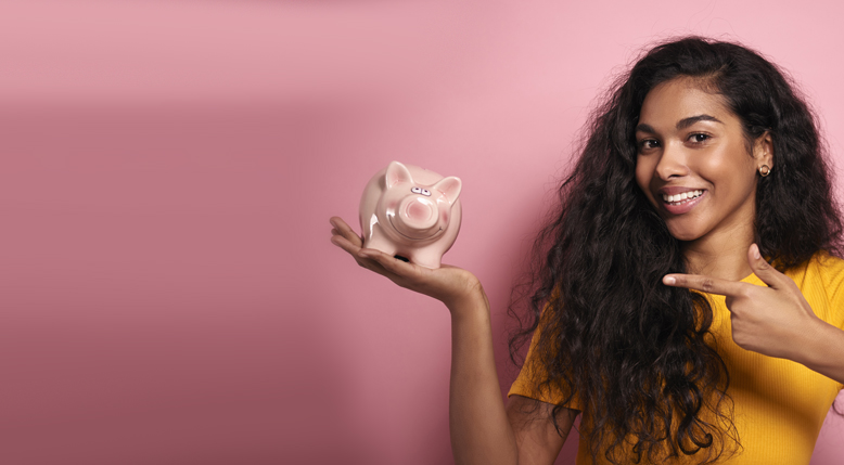 Woman holding piggy bank