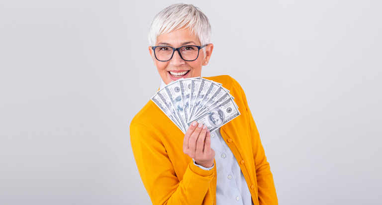 Woman holding cash