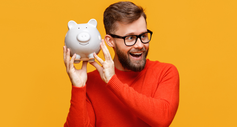 Man holding piggy bank